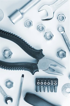 simsearch:400-03947919,k - Tools and nuts. Above view. Blue toned Stock Photo - Budget Royalty-Free & Subscription, Code: 400-06923362