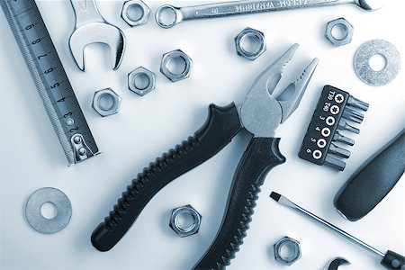 simsearch:400-03947919,k - Tools and nuts. Above view. Blue toned Stock Photo - Budget Royalty-Free & Subscription, Code: 400-06923363