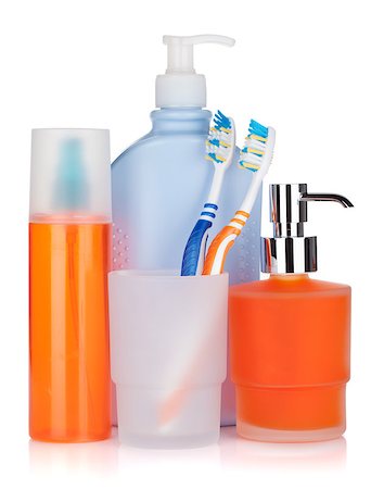 Cosmetics bottles, toothbrushes and liquid soap. Isolated on white background Photographie de stock - Aubaine LD & Abonnement, Code: 400-06923526