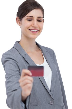 simsearch:400-06858518,k - Smiling businesswoman with credit card on white background Stock Photo - Budget Royalty-Free & Subscription, Code: 400-06931981