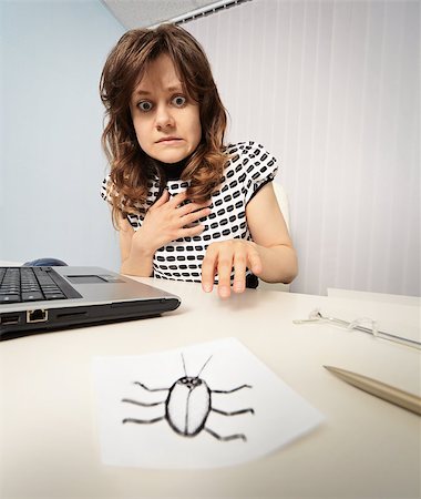 evil eye drawing - Woman scared cockroach drawn on paper Stock Photo - Budget Royalty-Free & Subscription, Code: 400-06948770