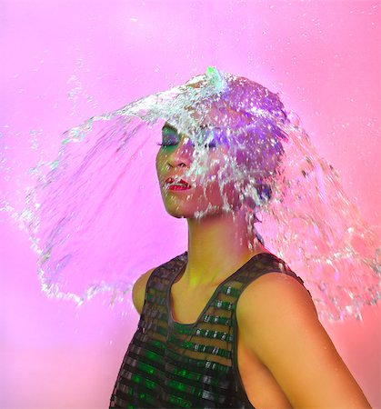 Creative Concept of Woman and Water Splashing on Top of Her Head Stock Photo - Budget Royalty-Free & Subscription, Code: 400-07035263