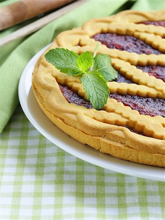 simsearch:400-04370315,k - homemade cherry tart of shortcake dough with jam Stock Photo - Budget Royalty-Free & Subscription, Code: 400-07045791