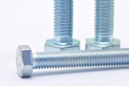 simsearch:400-05240852,k - Three galvanized steel screw on a white background Stock Photo - Budget Royalty-Free & Subscription, Code: 400-07047733