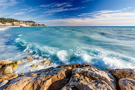 french riviera - Azure Sea and Beuatiful Beach in Nice, French Riviera, France Foto de stock - Super Valor sin royalties y Suscripción, Código: 400-07040938