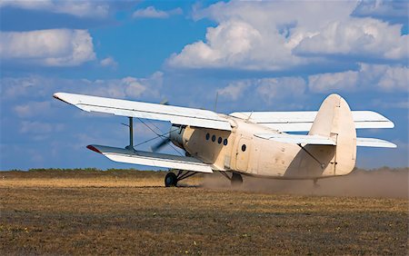 simsearch:400-08188604,k - old airplane takes off on the field Stock Photo - Budget Royalty-Free & Subscription, Code: 400-07043734