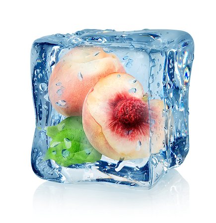 simsearch:400-05698489,k - Ice cube and peach isolated on a white background Stock Photo - Budget Royalty-Free & Subscription, Code: 400-07055912