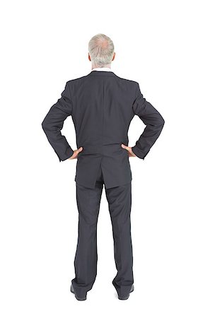 simsearch:400-04283915,k - Rear view of serious mature businessman posing on white background Stock Photo - Budget Royalty-Free & Subscription, Code: 400-07058206