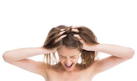 Bare girl with hands on head screaming against white background Stock Photo - Budget Royalty-Free & Subscription, Code: 400-07058377