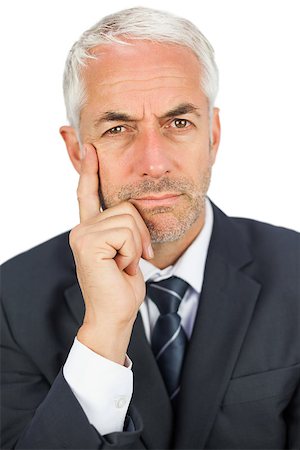 simsearch:400-04283915,k - Pensive mature businessman looking at camera on white background Stock Photo - Budget Royalty-Free & Subscription, Code: 400-07059359