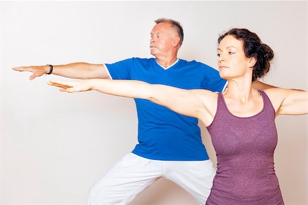 seniors yoga class - An image of some people doing yoga exercises Stock Photo - Budget Royalty-Free & Subscription, Code: 400-07050004