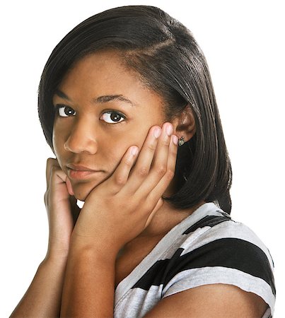 Sad teenage female in stripes over white background Stock Photo - Budget Royalty-Free & Subscription, Code: 400-07050223