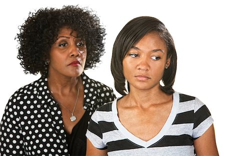 sad african children - Sad mother with teenage daughter on isolated background Stock Photo - Budget Royalty-Free & Subscription, Code: 400-07050245