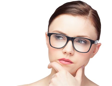 simsearch:614-01179436,k - Thinking natural model wearing classy glasses on white background Stock Photo - Budget Royalty-Free & Subscription, Code: 400-07060483