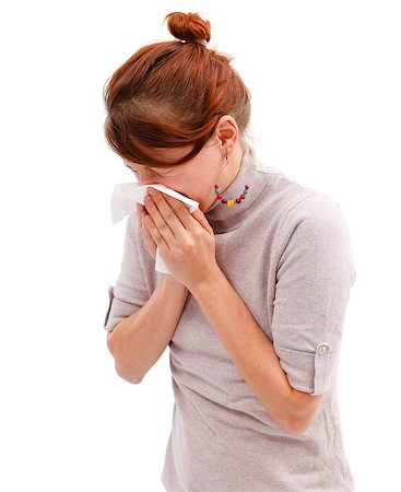 sensitive - Young allergic woman sneeze or blowing her nose Stock Photo - Budget Royalty-Free & Subscription, Code: 400-07086841