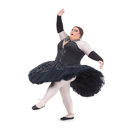 fat man in a tutu - Overweight drag queen dancing in a tutu nimbly balancing on tiptoe with his foot raised in a fun caricature of a female ballet dancer, on white Stock Photo - Budget Royalty-Free & Subscription, Code: 400-07089503