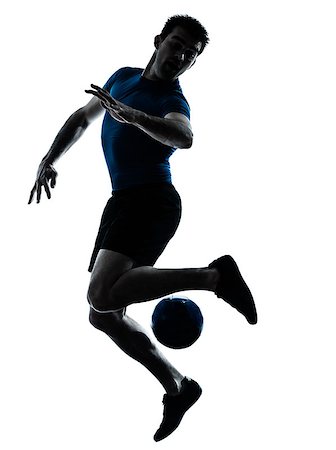 one caucasian man playing soccer football player silhouette  in studio isolated on white background Stock Photo - Budget Royalty-Free & Subscription, Code: 400-07089910