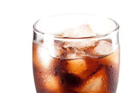 Fresh Cold Cola with ice in glass isolated on white background Stock Photo - Budget Royalty-Free & Subscription, Code: 400-07098166