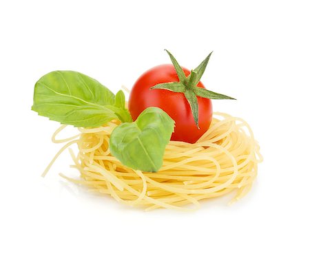 simsearch:400-06796273,k - Cherry tomato, basil and pasta. Isolated on white background Stock Photo - Budget Royalty-Free & Subscription, Code: 400-07098588