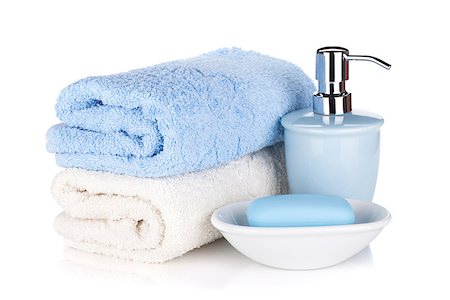 Soap and two towels. Isolated on white background Photographie de stock - Aubaine LD & Abonnement, Code: 400-07090525