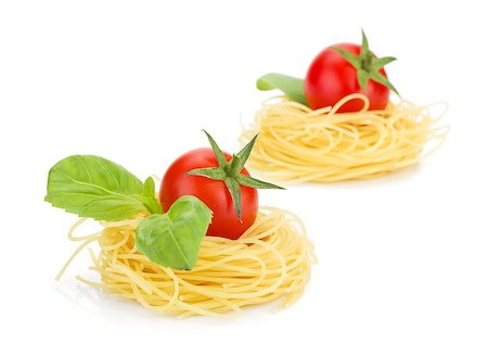 simsearch:400-06796273,k - Cherry tomatoes, basil and pasta. Isolated on white background Stock Photo - Budget Royalty-Free & Subscription, Code: 400-07090730