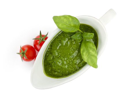 simsearch:400-06796273,k - Pesto sauce and cherry tomatoes. View from above. Isolated on white background Stock Photo - Budget Royalty-Free & Subscription, Code: 400-07090733