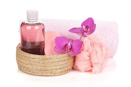 Cosmetics, towel and orchid flowers. Isolated on white background Photographie de stock - Aubaine LD & Abonnement, Code: 400-07090741