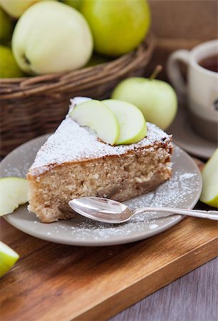 simsearch:400-04370315,k - Piece of homemade apple pie with cinnamon and apples on the background Stock Photo - Budget Royalty-Free & Subscription, Code: 400-07090834