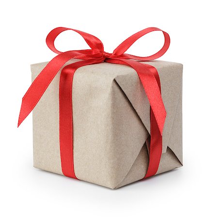 small gift box wraped in recycled paper with ribbon bow, isolated Stock Photo - Budget Royalty-Free & Subscription, Code: 400-07091837