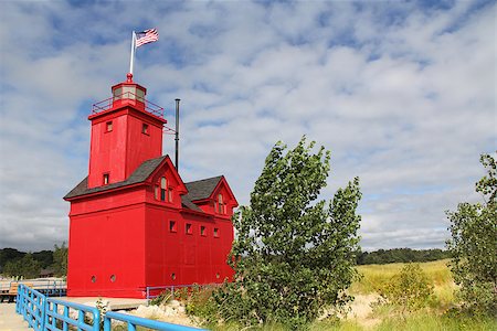 Big Red Lighthouse on the beach in Holland Michigan with copy space. Stock Photo - Budget Royalty-Free & Subscription, Code: 400-07093629