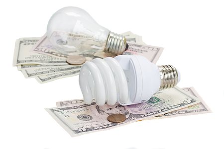 energy money - energy saving and normal  lamp bulbs on dollars  isolatd on white Stock Photo - Budget Royalty-Free & Subscription, Code: 400-07104625