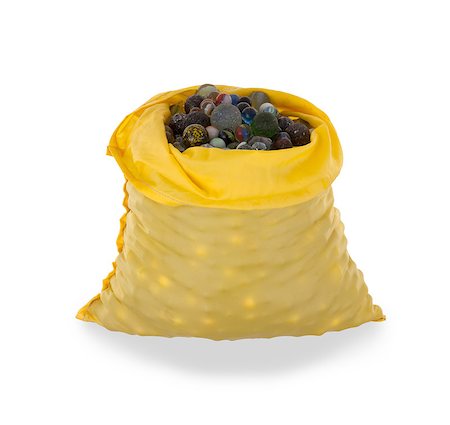 Assorted black glass marbles arranged in a yellow pouch, over a white background Stock Photo - Budget Royalty-Free & Subscription, Code: 400-07107601
