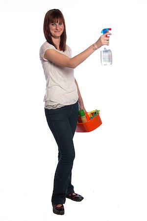 Young woman with window cleaner and a bucket filled with cleaning materials isolated on white background Stock Photo - Budget Royalty-Free & Subscription, Code: 400-07101791