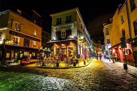PARIS - July 1: View of typical paris cafe on July 1, 2013 in Paris. Montmartre area is among most popular destinations in Paris, Le Consulat is a typical cafe. Stock Photo - Budget Royalty-Free & Subscription, Code: 400-07114402