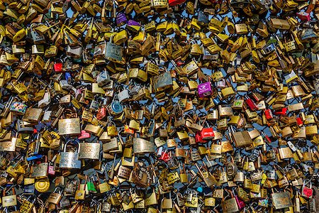 PARIS - JUNE 30: Love Padlocks at Pont des Arts on June 30, 2013, in Paris. The thousands of locks of loving couples symbolize love forever. Stock Photo - Budget Royalty-Free & Subscription, Code: 400-07115038