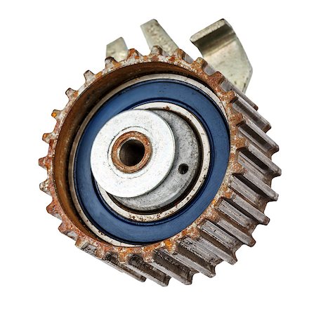 spare parts - Old pulley of timing belt of the internal combustion engine Stock Photo - Budget Royalty-Free & Subscription, Code: 400-07116853