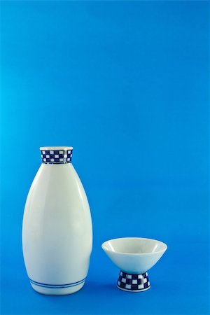 sake - Sake cup and pitcher on blue background Stock Photo - Budget Royalty-Free & Subscription, Code: 400-07113058