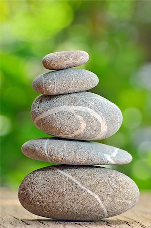 simsearch:400-04915648,k - Stacked stones on a green natural background Stock Photo - Budget Royalty-Free & Subscription, Code: 400-07113213