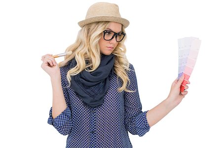 simsearch:400-04722731,k - Thinking trendy blonde holding color chart on white background Stock Photo - Budget Royalty-Free & Subscription, Code: 400-07126943