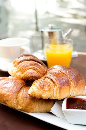 simsearch:400-05704519,k - Breakfast with coffee and croissants in a basket on table Stock Photo - Budget Royalty-Free & Subscription, Code: 400-07123079