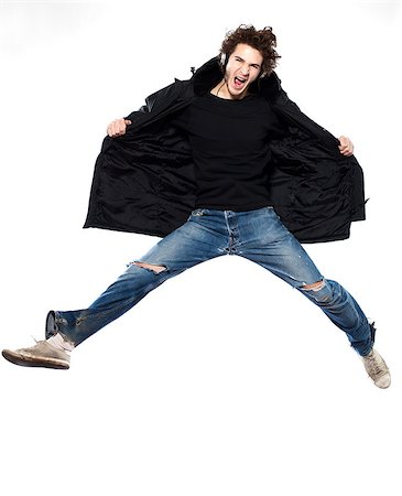 simsearch:614-07146649,k - studio portrait of one  caucasian young man listening to music music jumping screaming isolated on white background Foto de stock - Super Valor sin royalties y Suscripción, Código: 400-07123839