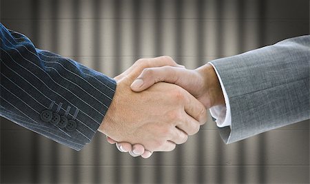 simsearch:640-03262464,k - Close up of business people handshaking Stock Photo - Budget Royalty-Free & Subscription, Code: 400-07142869