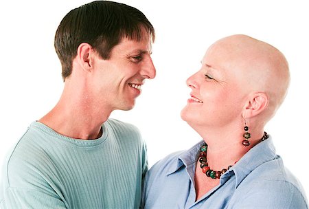 Cancer patient smiles at her loving, supportive husband.  White background. Stock Photo - Budget Royalty-Free & Subscription, Code: 400-07165103