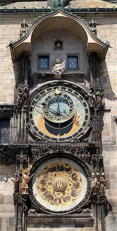 simsearch:400-05732427,k - The Astronomical Clock, a medieval landmark mounted on the wall of Old Town City Hall in Prague, Czech Republic. Stock Photo - Budget Royalty-Free & Subscription, Code: 400-07165606