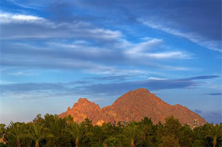 phoenix arizona - Looking across vivid green trees at Camelback Mountain against a deep blue sky.  Phoenix, Arizona, USA. Stock Photo - Budget Royalty-Free & Subscription, Code: 400-07165801