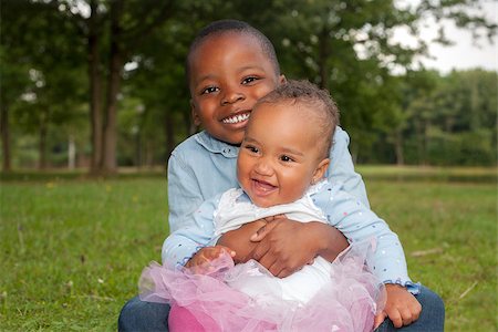 Happy little children are having a nice day in the park Stock Photo - Budget Royalty-Free & Subscription, Code: 400-07165993