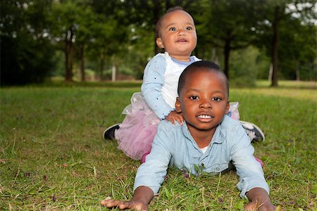 Happy little children are having a nice day in the park Stock Photo - Budget Royalty-Free & Subscription, Code: 400-07166003