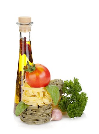 simsearch:400-06796273,k - Italian food: pasta, tomatoes, olive oil. Isolated on white background Stock Photo - Budget Royalty-Free & Subscription, Code: 400-07166507