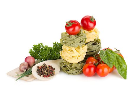 simsearch:400-06796273,k - Italian food: pasta, tomatoes, fresh herbs. Isolated on white background Stock Photo - Budget Royalty-Free & Subscription, Code: 400-07166520