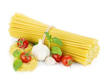 simsearch:400-06796273,k - Italian pasta, tomatoes, basil and garlic. Isolated on white background Stock Photo - Budget Royalty-Free & Subscription, Code: 400-07166668